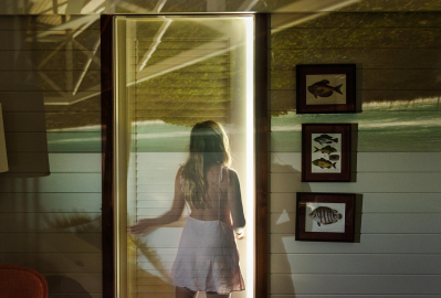 A girl going through the door.