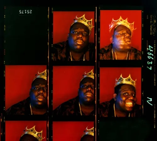 Frames of the Notorious BIG wearing a crown. 