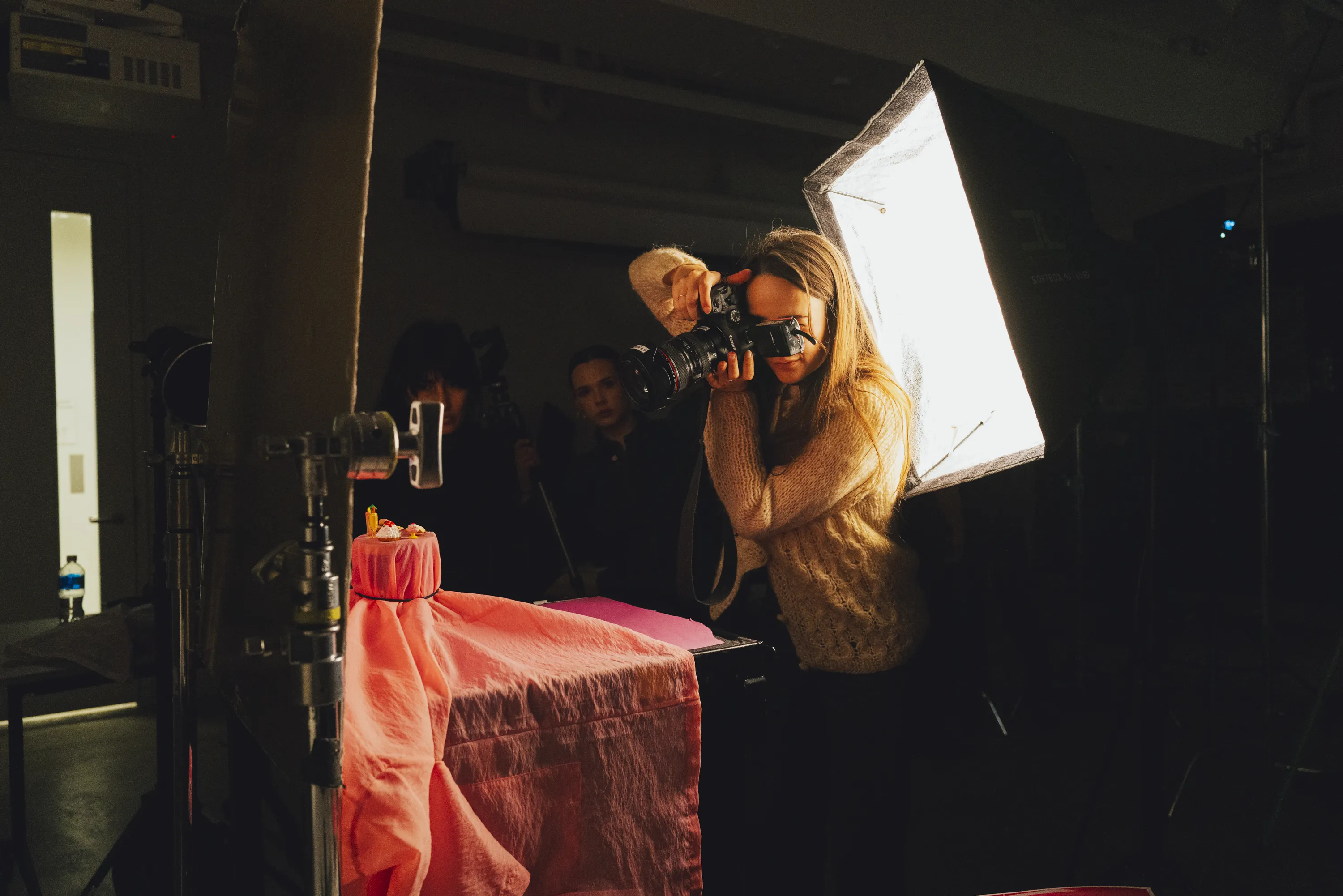 Student working in lighting studio