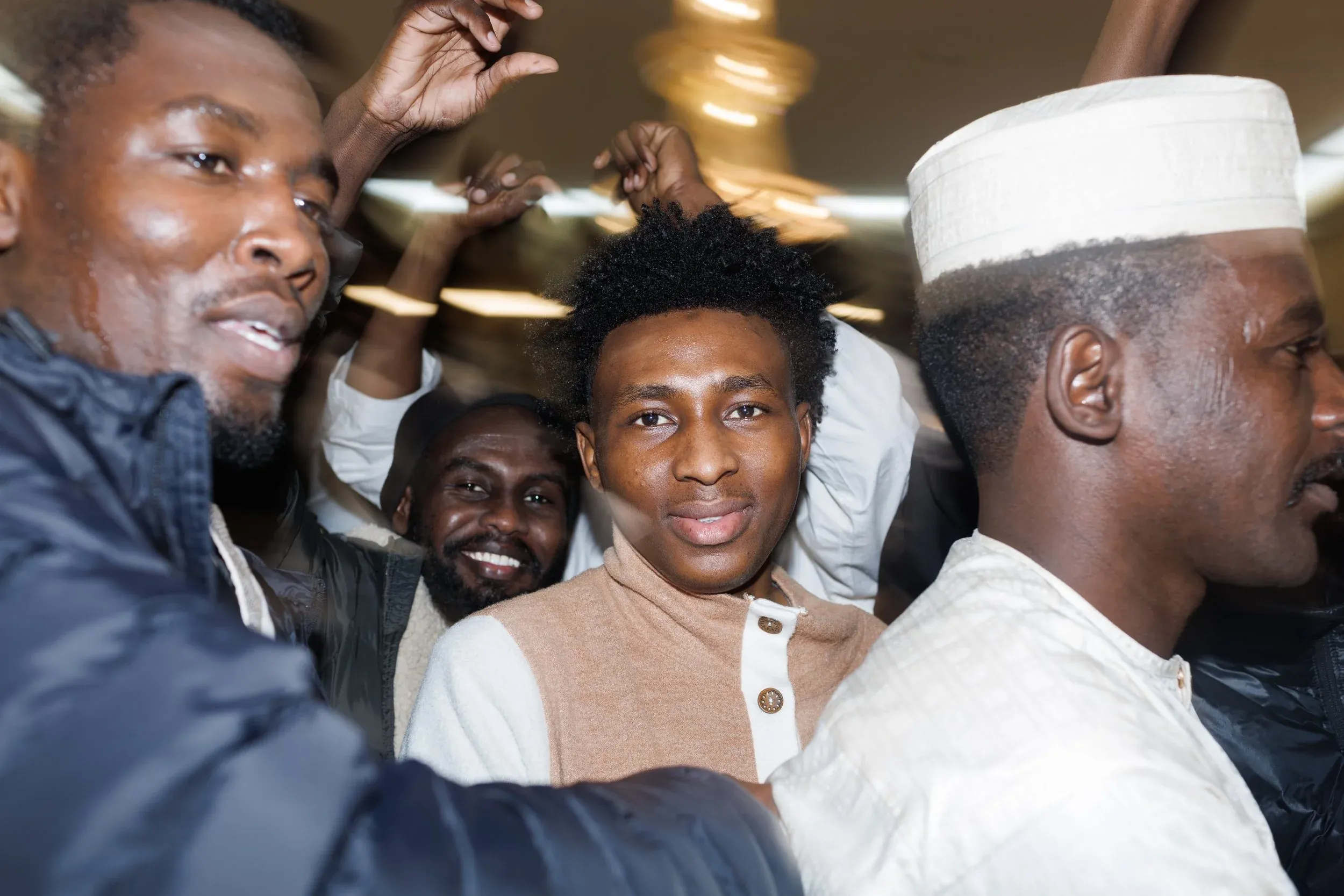 Group of men from Al zaghawa tribe on Sanousi wedding at Waddy Hall. Brooklyn, New York. 2024. Photo by Walaa Yassien.